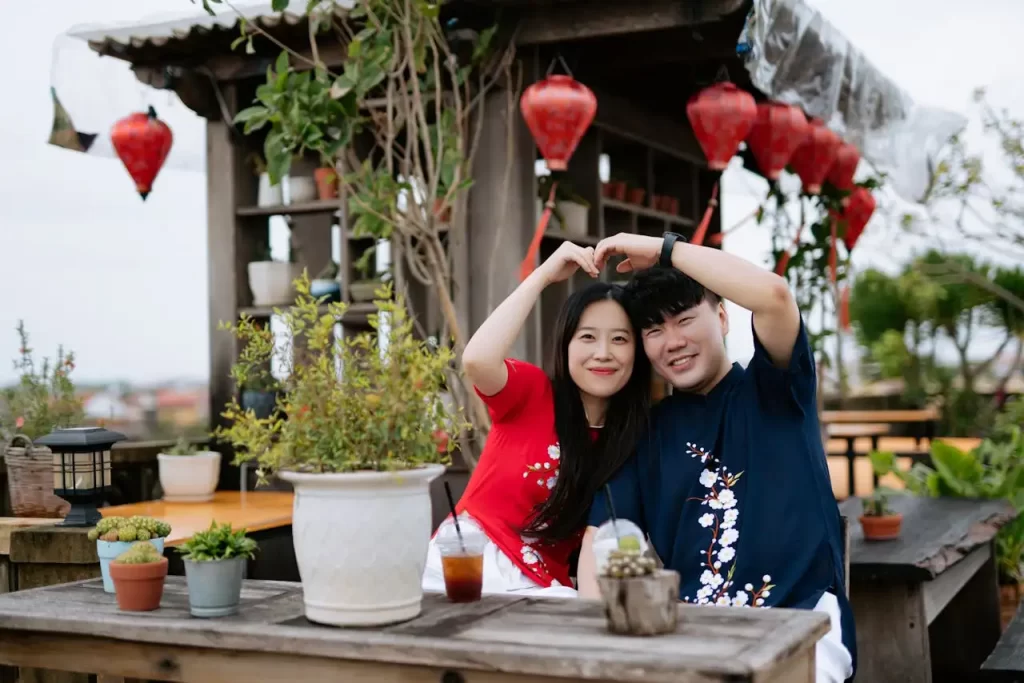 Japanese couple posing for a photo